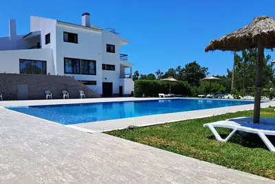 Image de Suíte c/ wc privado, sala e terraço na Casa das Vinhas em Sesimbra