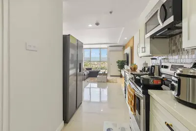 Image de A Pool, A Beach & A Beautiful Apartment - Book Now