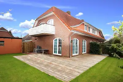 Image de Maison de vacances à Dornum mit Garten