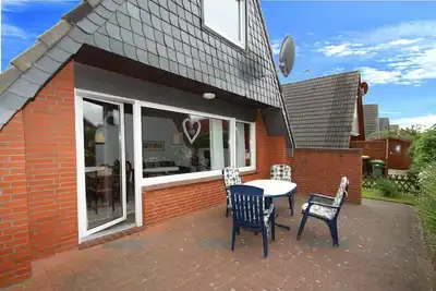 Image de Maison de vacances Toms Hutte avec terrasse א Dornum