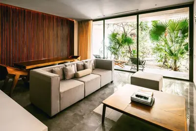 Image de Tranquil ground-floor retreat with lush pool oasis - steps to adventure