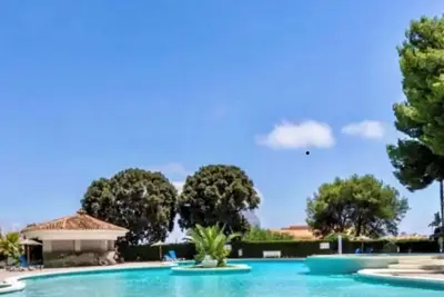 Image de Charming house in quiet urbanization next to the town center and beaches.