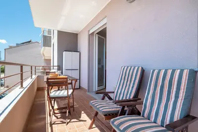 Image de Appartement 'Clhome Tranquillità E Comfort' avec terrasse privée, Wi-Fi et climatisation
