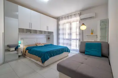 Image de Appartement 'Clhome Comfort Nel Cuore Di Alghero' avec balcon et climatisation