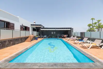 Image de Villa de vacances 'Casa Los Llanos Teseguite Lanzarote' avec vue sur la mer, piscine privée et Wi-Fi
