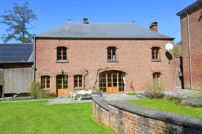 Image de Gîte avec court de tennis