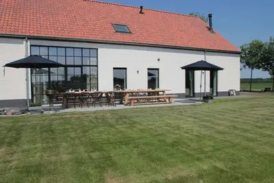 Villa confortable à Zuidzande avec jardin privé