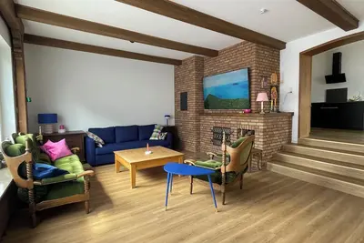 Image de Special 90 m² vacation apartment with house bar in Berge