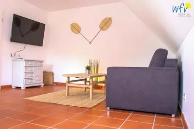 Image de Comfortable vacation apartment Strandkamille in the vacation home at Gutspark Dranske