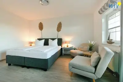 Image de Spacious vacation apartment in Dranske with garden, terrace and playground