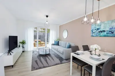 Image de Stil und Komfort Terrasse - Parkplatz