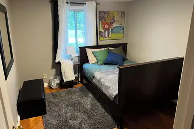 Image de Enjoy cottage living. Just a short walk away from the beach!