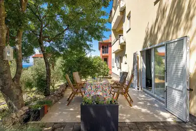 Image de Appartement de vacances avec terrasse et 2 salles de bains