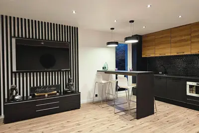 Image de Appart design - Jaccuzi Sauna - salle de sport\n4 personnes