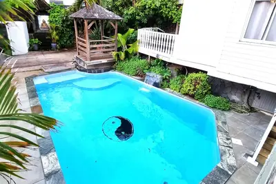 Image de Bienvenue à la Zolie Kaz appart tout confort à 5 min de la plage de Terre Sainte