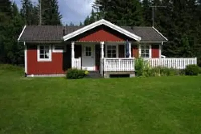 Image de Typical red and white holiday home in the countryside in Småland