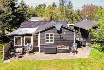 Image de Maison de vacances pour 6 a Blokhus-By Traum