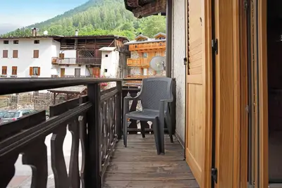 Image de Appartement 'Casa Picchio' avec vue sur montagne et balcon