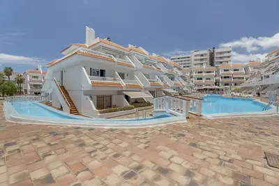 Image de Appartement de vacances 'Sun and River Condo' avec piscine partagée, terrasse privée et Wi-Fi