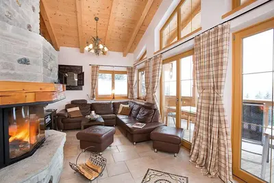 Image de Chalet with breathtaking mountain views, sauna, and proximity to the lift in the