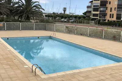 Image de Saint Cyprien - T2 Rdc 4p avec piscine, proche plage et port, parking privé, animaux admis