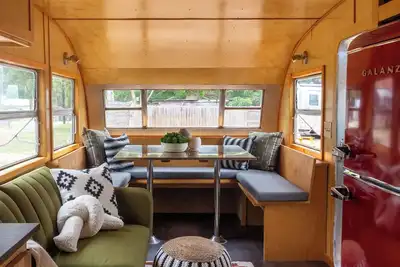 Full Bed with Bathroom, Living Room, Kitchenette, and Mini Fridge
