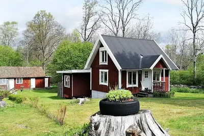Image de Maison de vacances pour 4 a Holmsjö-By Traum