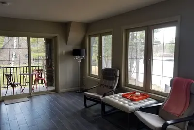 Image de Upscale lake front second floor unit in Wells, Ny with stunning views and WiFi