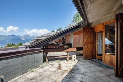 Image de Appartement 'Il Nido di Pila' avec vue sur la montagne et terrasse privée