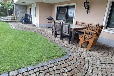 Image de Appartement 'Wohnung Ländliche Lage Mit Springbr' avec terrasse privée, jardin privé et Wi-Fi