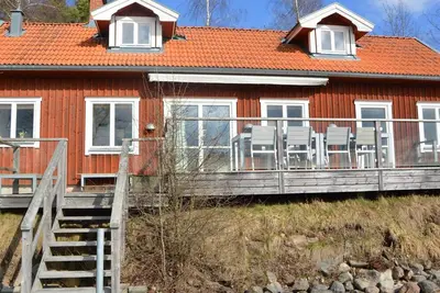 Image de Maison de vacances pour 8 a HJÄLTEVAD