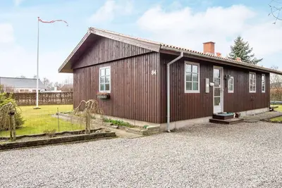 Image de Maison de vacances pour 9 a Grenaa-By Traum