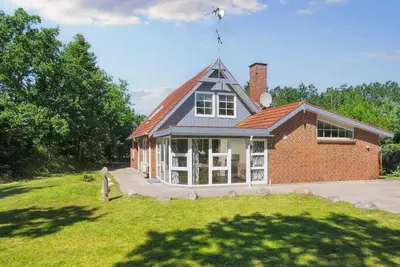 Image de Maison de vacances pour 10 a Glesborg-By Traum
