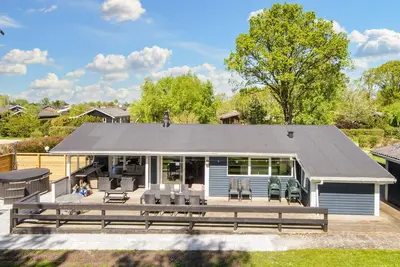 Image de Maison de vacances pour 10 a Glesborg-By Traum
