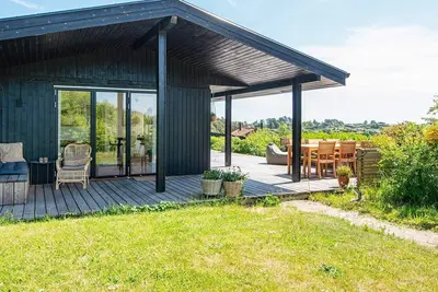 Image de Maison de vacances pour 8 a Ebeltoft-By Traum