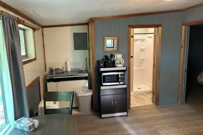 Image de Rustic cabins in secluded campground with lake access and woods to wander in.