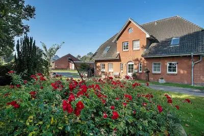Image de Appartement 'Ferienwohnung Andresen Högel' avec terrasse partagée, jardin partagé et Wi-Fi