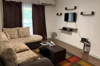 Image de 2-bedroom apartment with WiFi, Ac in delightful Rehab city in heart new cairo