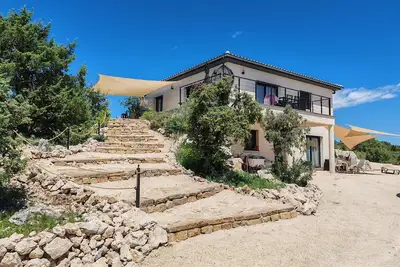 Image de Maison avec jacuzzi privé