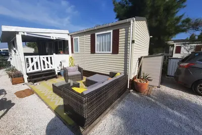 Image de Mobil home climatisé tout confort 200m de la plage 6 couchages