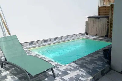 Image de Homerez - Appartement charmant avec piscine privée à Sainte-Marie
