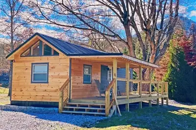 Image de Cozy cabin, hot tub, 5 min from national park, Wears valley, pool access