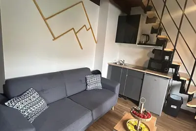 Image de Reve Divan T4-vue sur le montagnes, Parking, Terrasse Salle de sport Aire de jeux