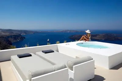 Image de Breathtaking Santorini Apartment | Zenon Apartment | 2 Bedrooms | Private Furnished Terrace with Outdoor Jacuzzi and a Hydro on the Oversized Roof-top Terrace with Spectacular Caldera and Volcano Views | 25is Martiou, Imerovigli