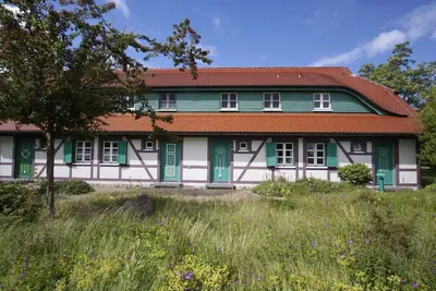 Image de Vacation apartment close to the beach with private terrace - Feriendorf Bakenberg FeWo C27 -