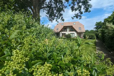 Image de Spacious half of the house for a whole family. . . .