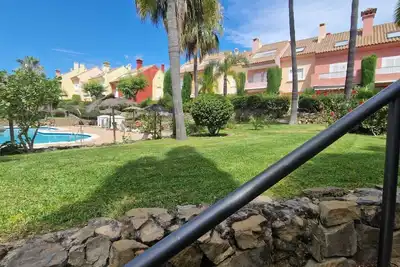 Image de Adosado en Islantilla con Jardìn