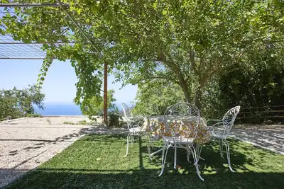 Image de Maison de vacances 'Rustico 'al Casale'' avec vue sur la mer, jardin partagé et Wi-Fi