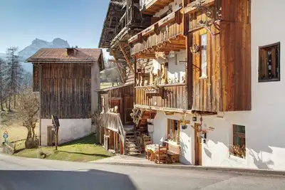 Image de Appartement « Le Cœur des Dolomites » avec vue montagne, terrasse et jardin privés