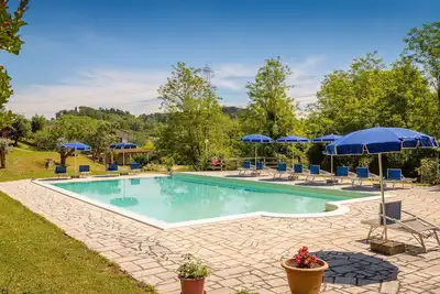 Image de Maison de vacances 'Poggio4' avec piscine partagée, terrasse privée et Wi-Fi